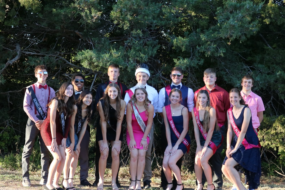 The Crofton Homecoming Court. Back row: Jackson Lynde, DaLando Hughes, Jace Foxhoven, Wesley Lucht, Garret Buschkamp, Thomas Maibaum, and Simon Mc- Farland. Front row: Lillie Earley, Samantha Strunk, Caitlin Guenther, Megan Tramp, Rebecca Leader, Summer Guenther, and Fiene Adler