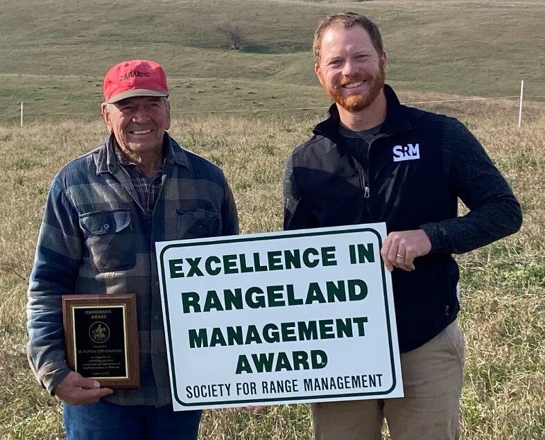 Wayne Rasmussen (left) presented his rangeland management award.