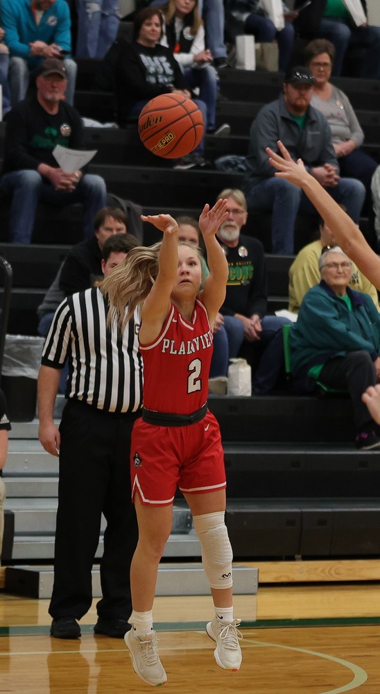 Keanu Johnson streches for a three against Elkhorn Valley.