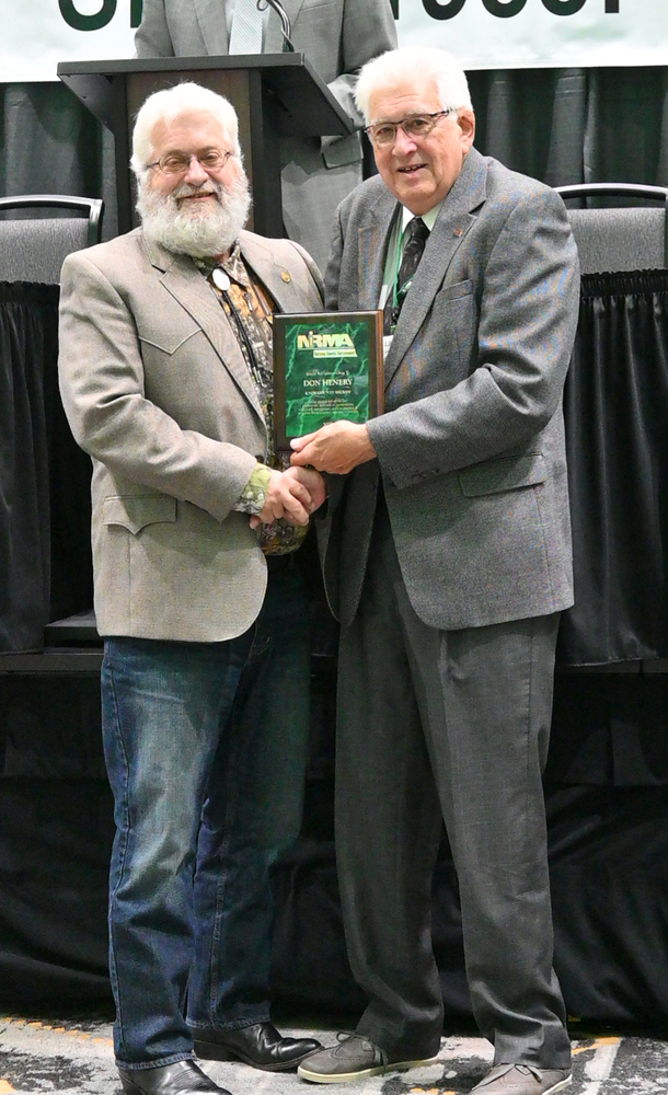 Knox County Sheriff Don Henery is shown accepting his 2022 Special Recognition award from NIRMA Board of Directors Chairperson Larry Cerny at the program’s annual membership conference in Kearney on October 20.