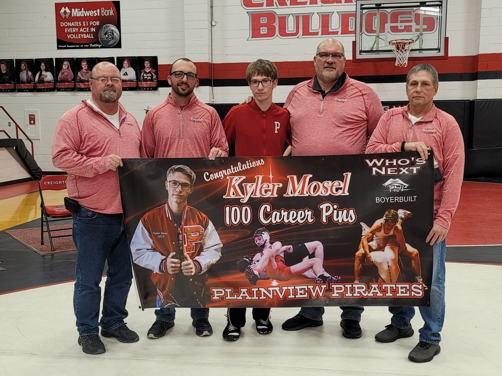 Kyler Mosel pictured with coaches (l to r): Mark Wragge, Caden Alexander, Chad Schumacher and Dean Boyer