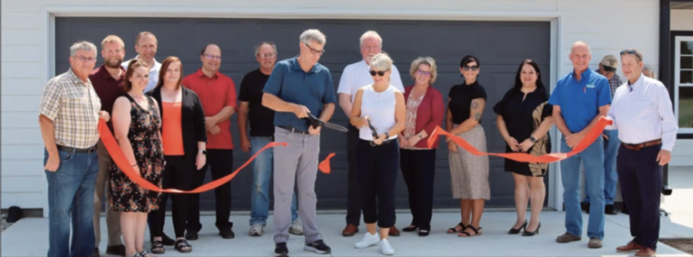 Those dignitaries at the ribbon cutting included (l to r): Bob Smith (PCED Board/Mayor), Jeremy Tarr (PCED Board/city admin), Courtney Retzlaff, Kevin Lingenfelter (LB840 Board), Jody Born, Chad Anderson (Pierce city administrator & PCED Board), Robert Wehrer (PCED Board/Village of Hadar council member, Jim & Laurie Meuret (project investors/owners), Martin Griffith (NENEDD housing construction manager) Christine Rasmussen (Northeast Nebraska DED housing specialist), Mandy Gear (NENEDD housing staff), me, Kelly Cobb (Project manager Green Gables Contracting), Barry Dekay (senator).