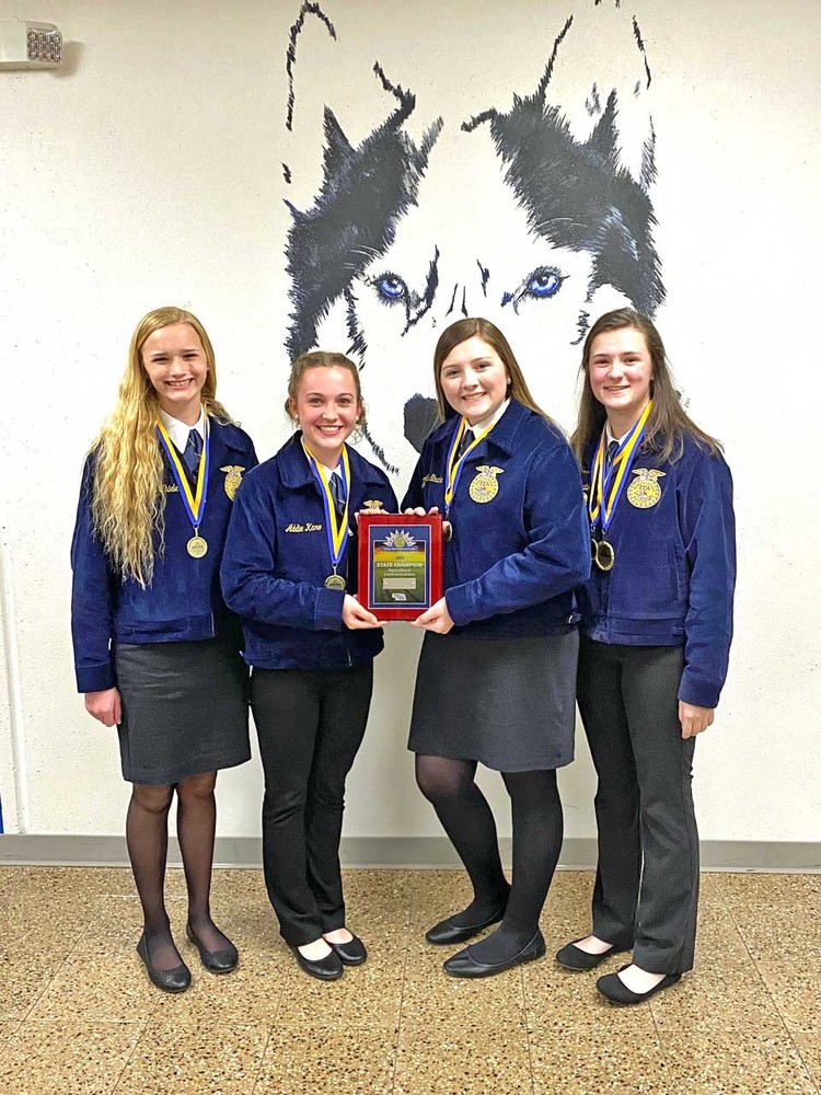 State Champion Ag Communications Team members are Abigail Thiele, Addison Karo, Alexis Stracke, and Jordyn Laible.