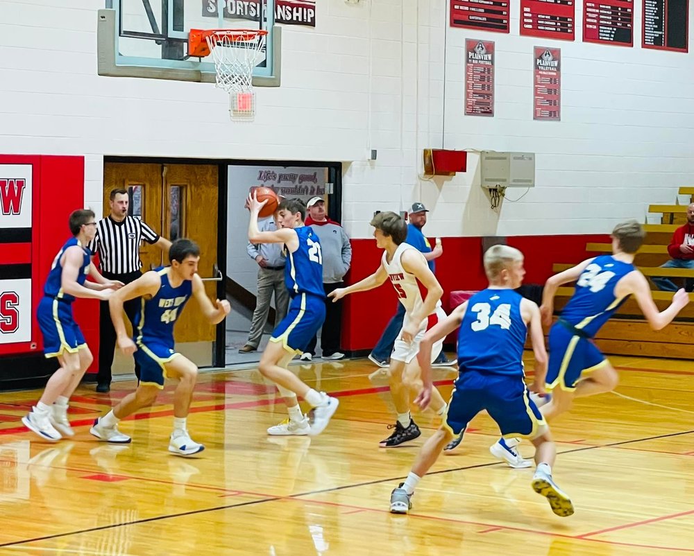 West Holt Basketball action against Plainview