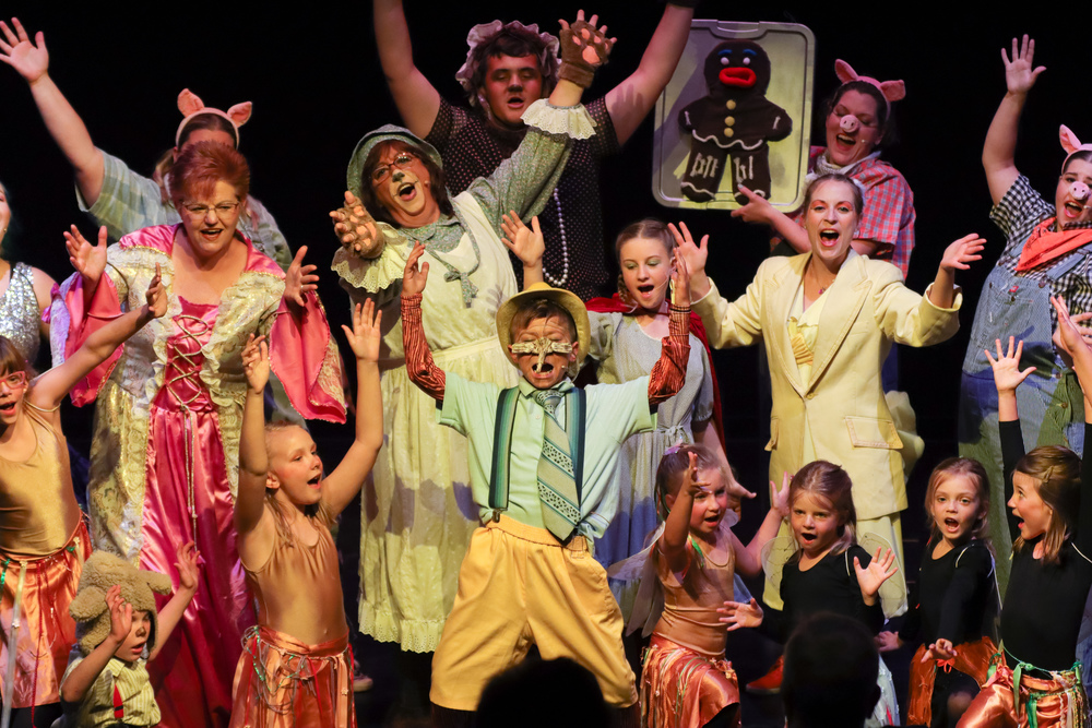 Some of the cast of Shrek The Musical during one of the shows musical number