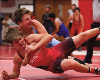 Jaegar Frahm (front) works for an escape against his opponent.
