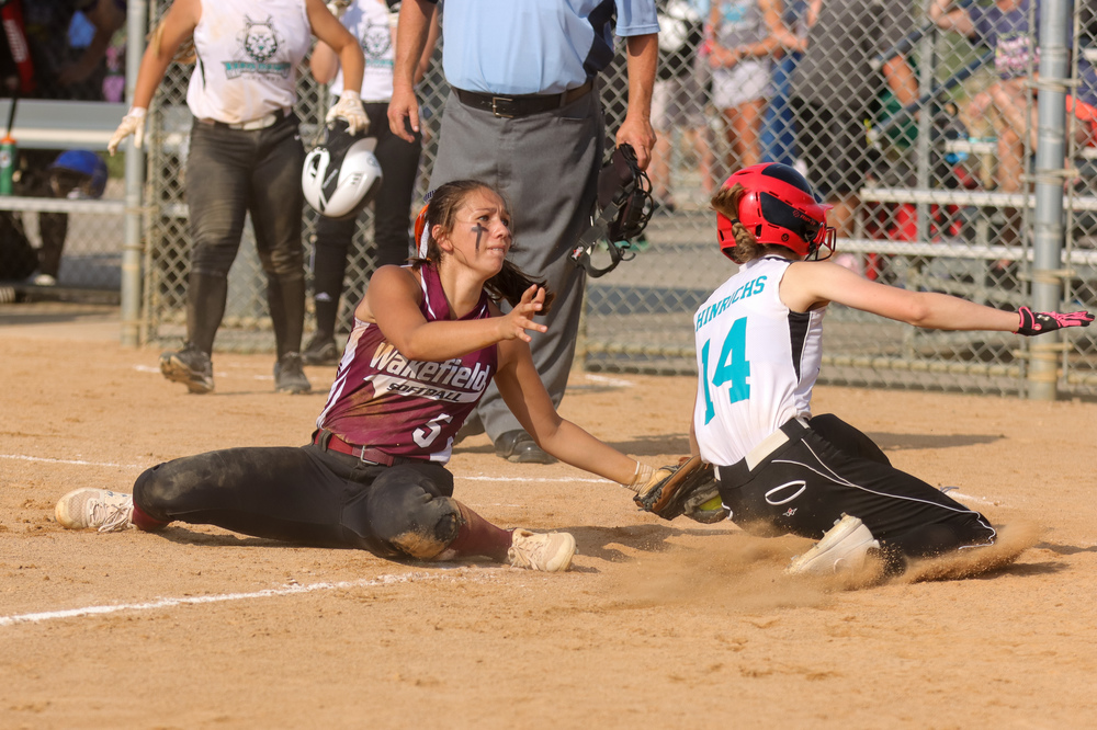 Alex Arenas covering home plate