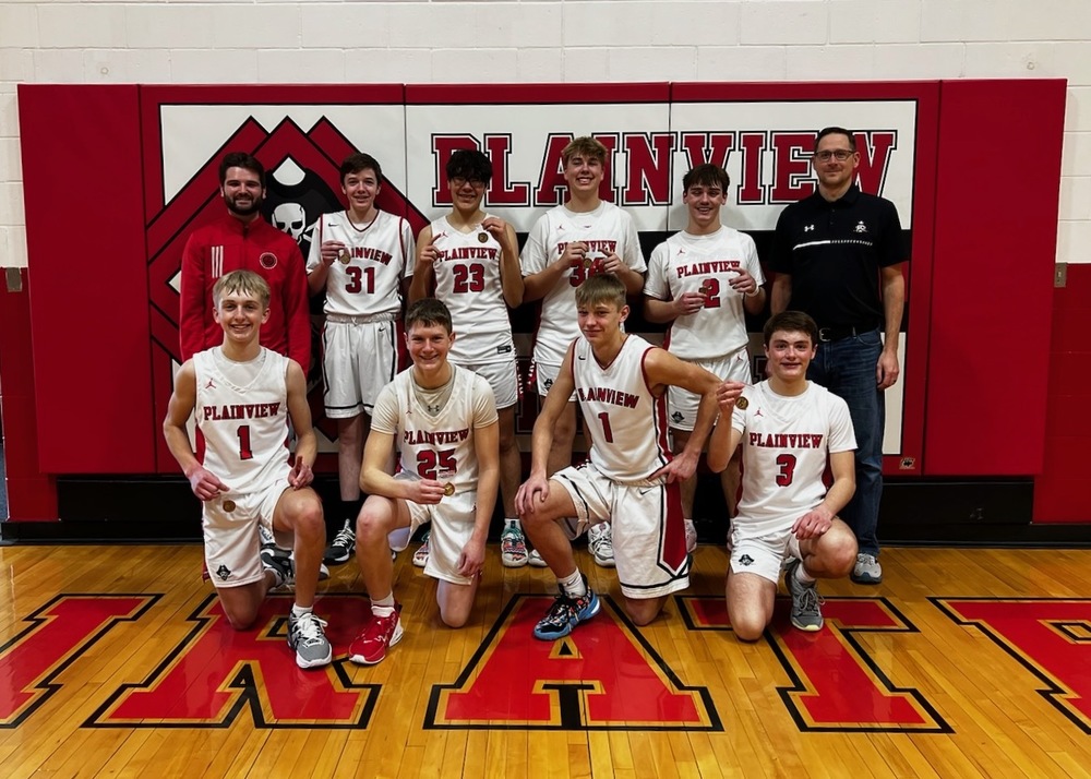 The Plainview Pirate Freshman/Sophomore tournament champion team included, front row (l to r): Karter Lingenfelter, Corben Kment, Lenyn Ickler and Rece Frahm; and back row: Coach Taylor Oestreich, Trindan Ziems, Trevin Petersen, Harrison Thor, Jacson King and Coach Tom Sauser
