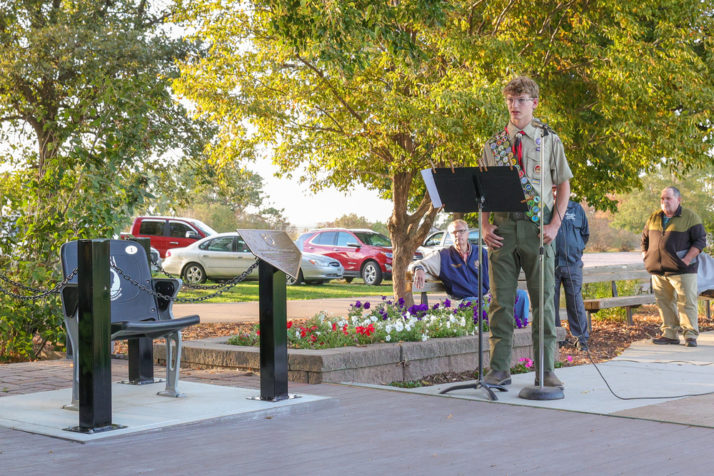Jack speaking at the dedication with his project to the left