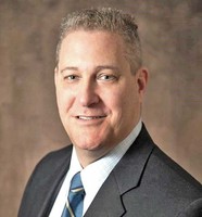 Martin hired as CEO of Medical Services