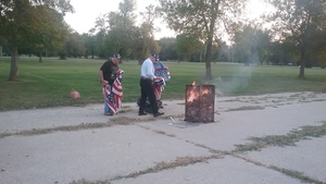 Flag Burning Ceremony Held