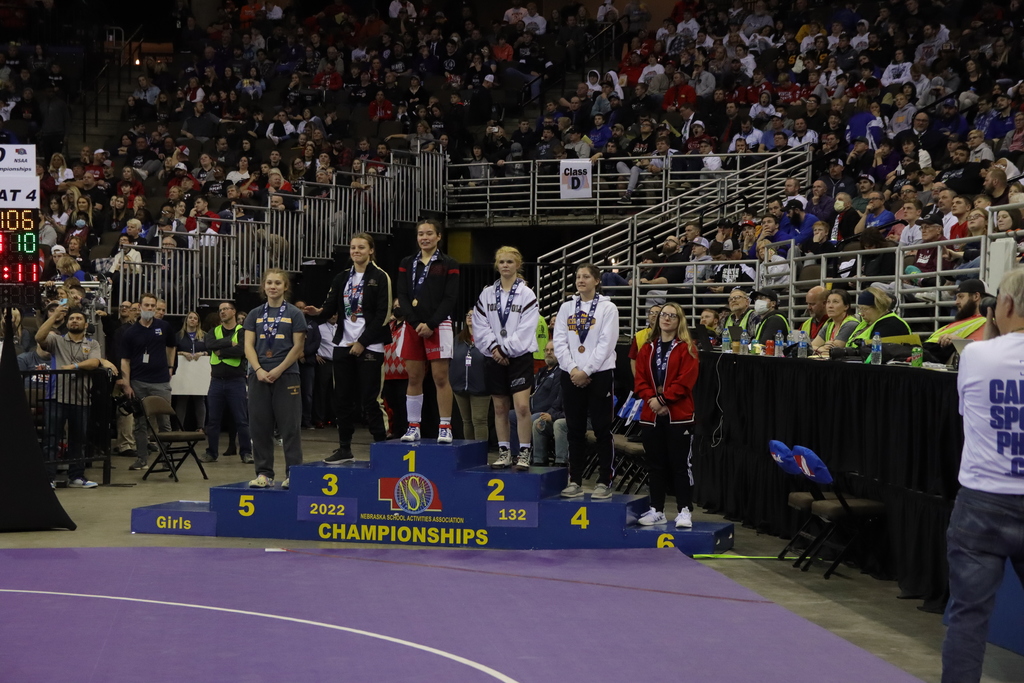 Madison Davis on the medal stand at the State Wrestling Meet.