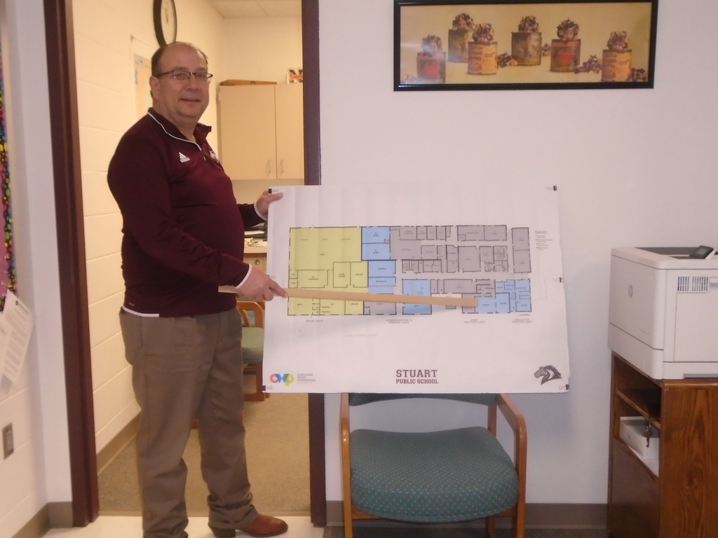 Stuart Public Schools Superintendent Robert Hanzlik with the plans for the renovations to be done at the school.	Photo by Lorraine Lieswald