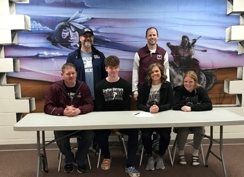 Those that were pictured for his signing day were, back row (l to r): Concordia Pole Vault Coach Jason Berry and Crofton Track Coach Mickey Doerr; and front row: Johnnie Ostermeyer, Mayson Ostermeyer, Robyn Ostermeyer and Addyson Ostermeyer.