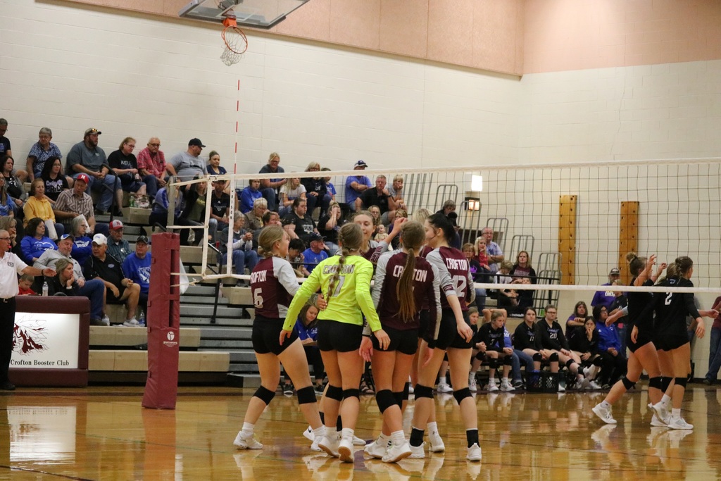 The Lady Warriors celebrate after scoring a point