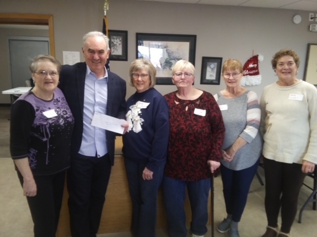 Senior Center Board members: Pat Wakeley, Janet Lammers, Norma Kuehler, and Mindy Zavadil, along with Crofton Senior Center manager, Sandy Truman accept a $5,000 donation from the Enid Kollars family.