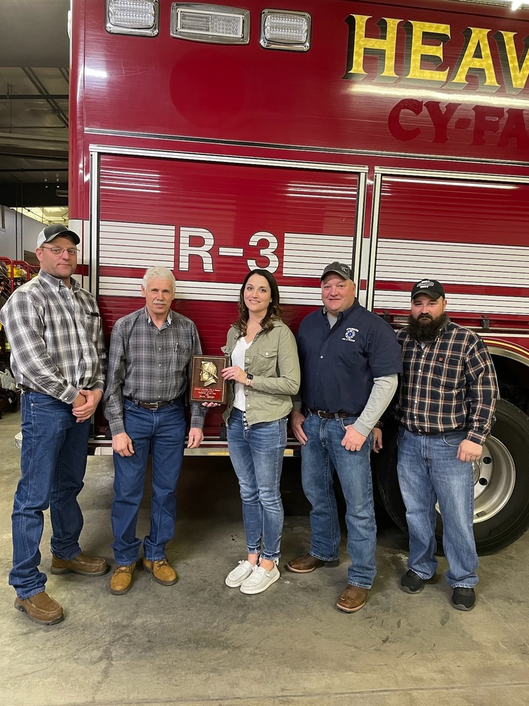 Members of the Atkinson Rural Fire Board Greg Hansen and Don Holtgrew, Jacqueline Keogh, Rural Fire Board members Casey Poessnecker and Tehran Klinger. Keogh received the Fireman of the Year award for her husband Ryan who died in an accident last year. Rural Fire Board Member Dean Seger is not pictured.