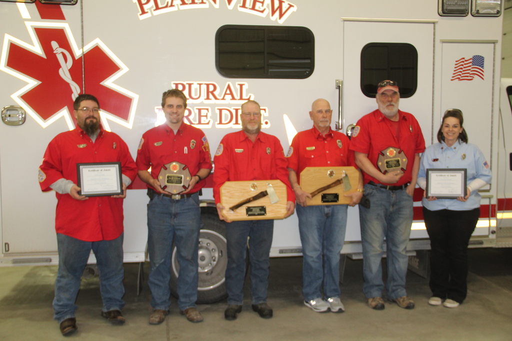 Department awards went to (left): Rookie of the Year, Mathew Hinton; Firefighter of the Year, Ty Hampton; Award of Merit, Cody Peterson; and EMT of the Year, Courtney Retzlaff; and (right), Years of Service awards: Kevin Leiting, 5 years; Brian Bowman, 15 years; Kyle Tarr and Gale Retzlaff, 35 years; Tim Kudera, 20 years and Courtney Retzlaff, 5 years; not pictured: Seth Williams and Chris Burger, 5 years and Lois Patras, 35 years.